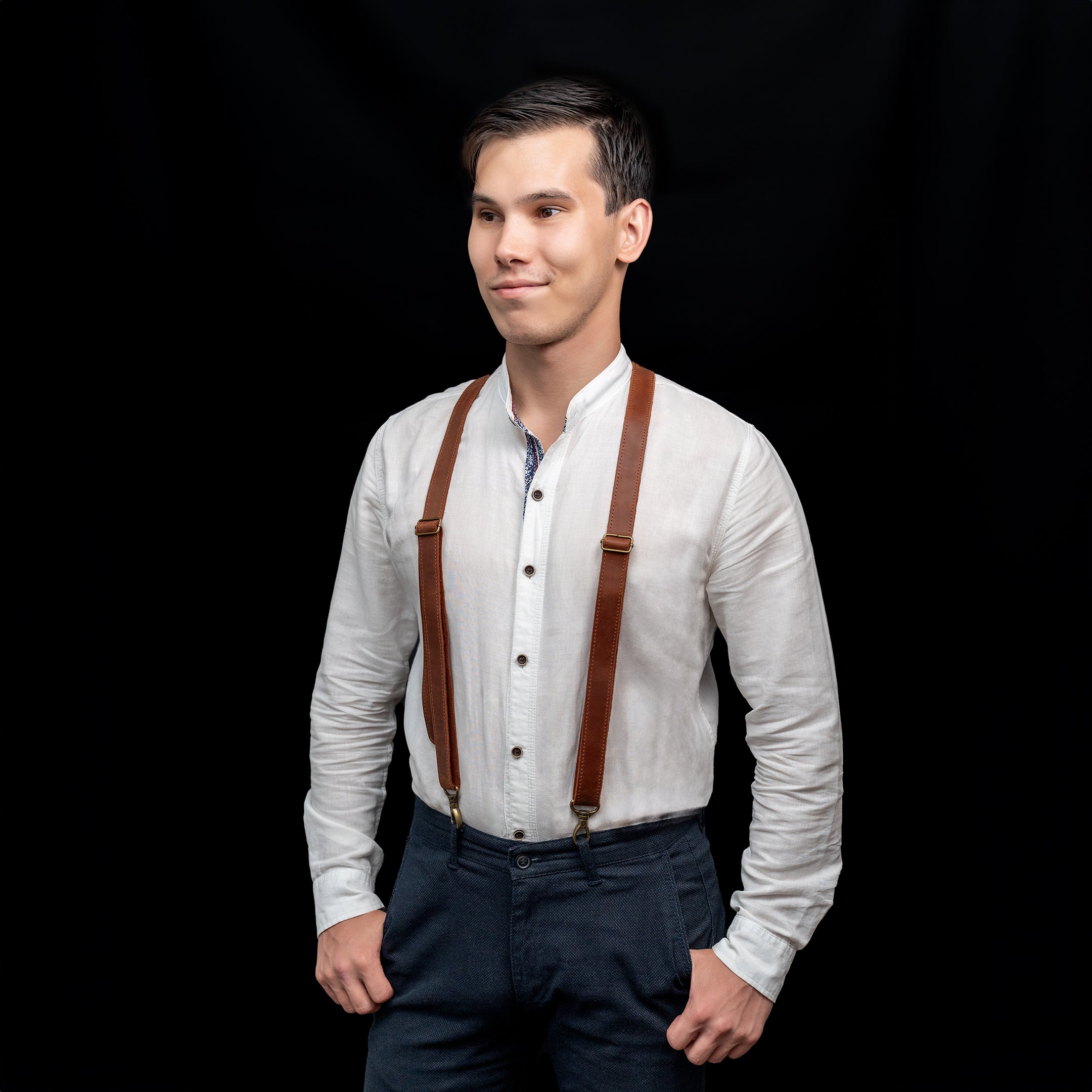 Man with leather suspenders